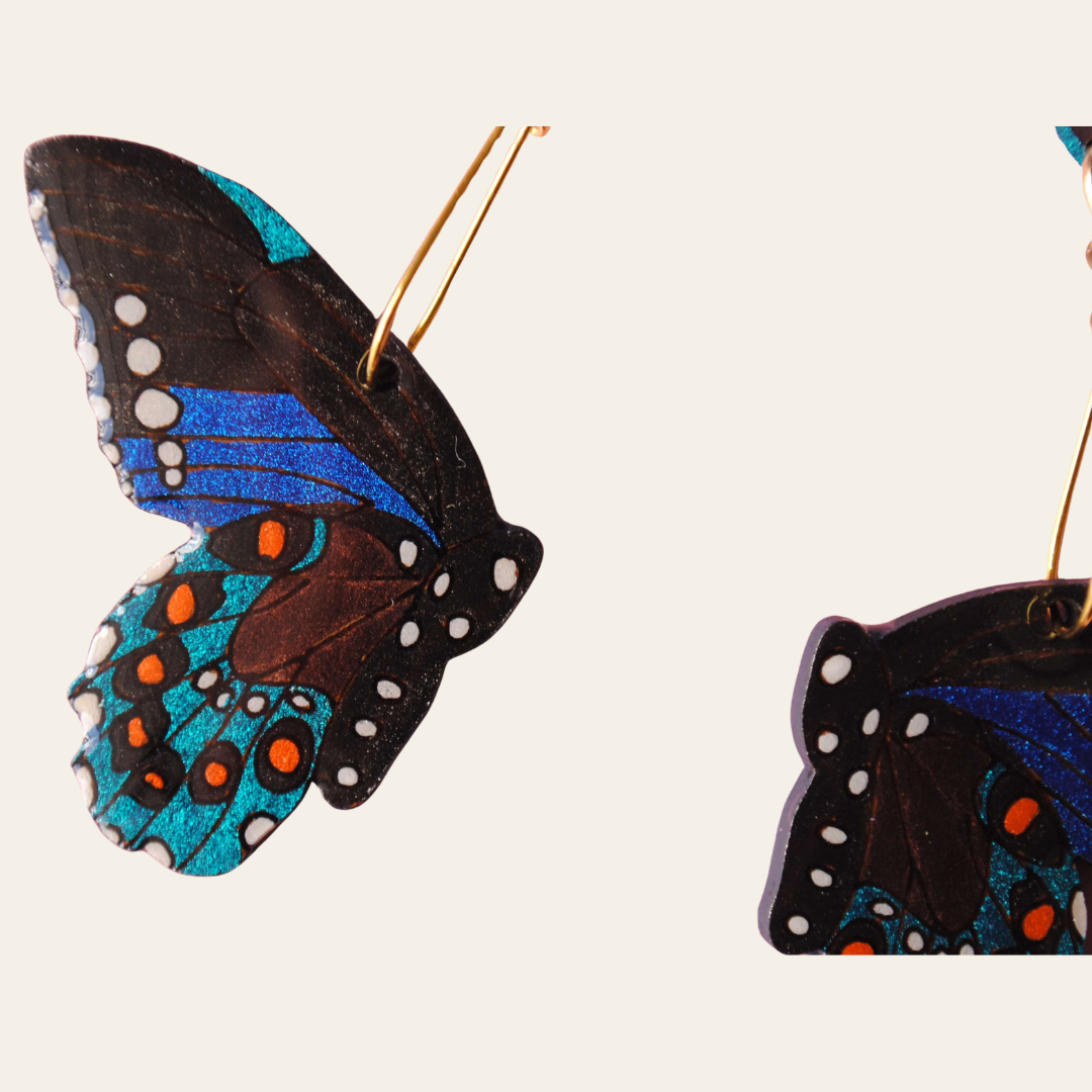 ARETES MARIPOSAS NEGRAS CON AZUL
